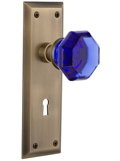 New York Mortise Lock Set with Colored Waldorf Crystal Glass Knobs Cobalt Blue in Antique Brass.